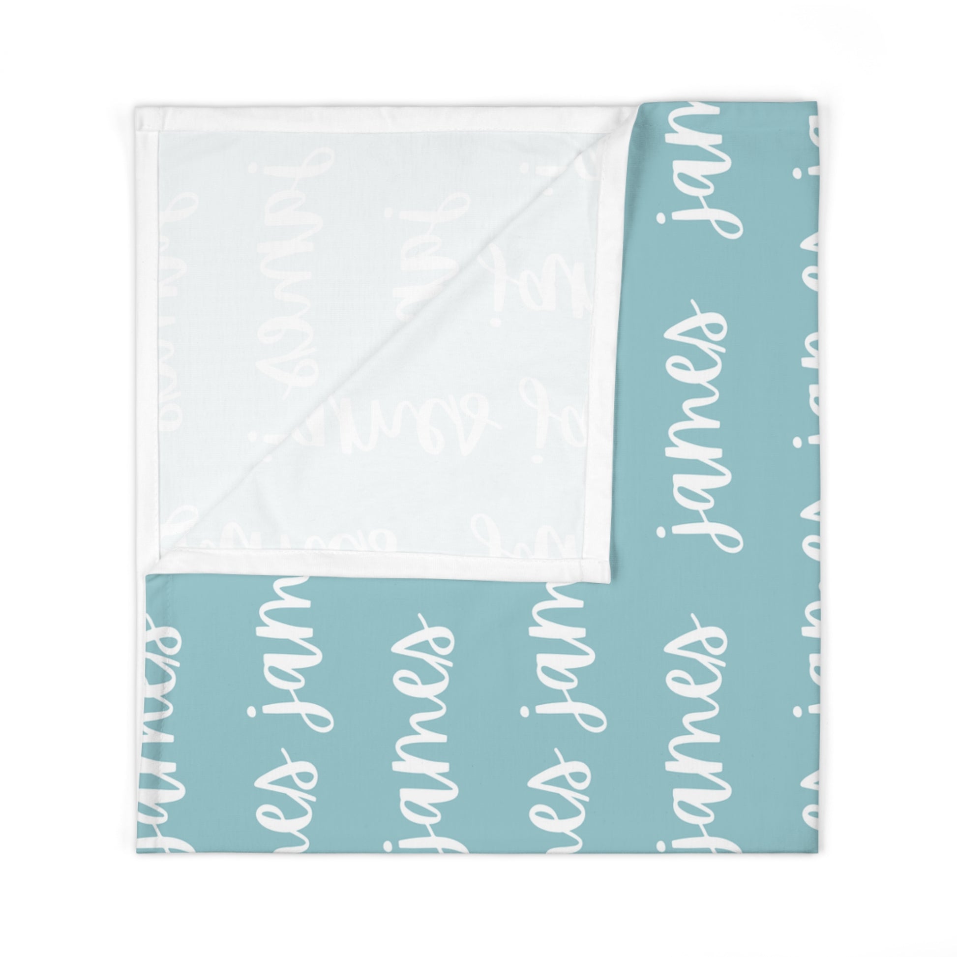 aqua blue swaddle blanket with custom name in white, made out of jersey knit. The design is printed on one side.