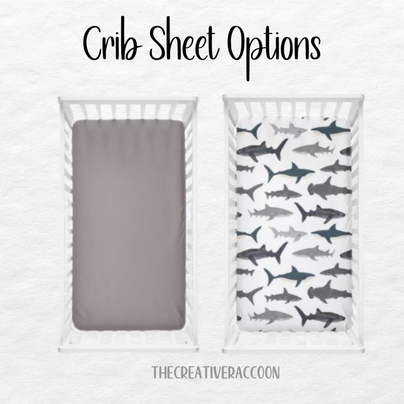Gray crib sheet and shark-patterned crib sheet in a white crib.
Nautical Bedding Shark Theme Crib Bedding Blue Nursery - The Creative Raccoon