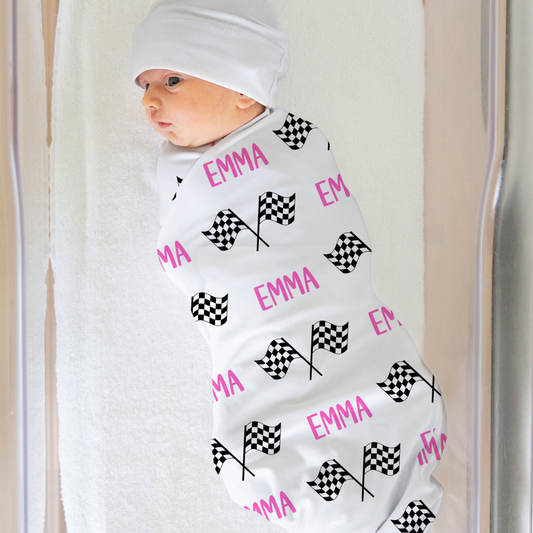 racing chekered flag with name swaddle blanket. Name shown in pink. Matching hat available upon request.