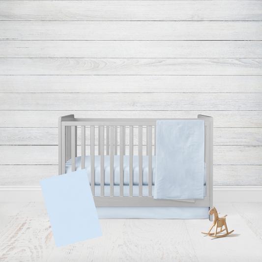 4-piece set - light blue blanket, crib sheet, crib skirt, & changing pad cover.