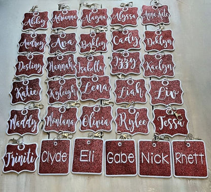 Collection of name tags with various names printed on them against a white background
Custom Cheer Bag Tag, Team Gift Ideas - The Creative Raccoon