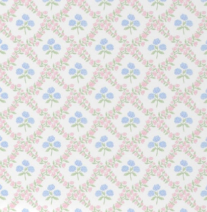Pattern of pink and blue flowers on a white background. Floral Hydrangea Blue & Pink Crib Sheet - The Creative Raccoon