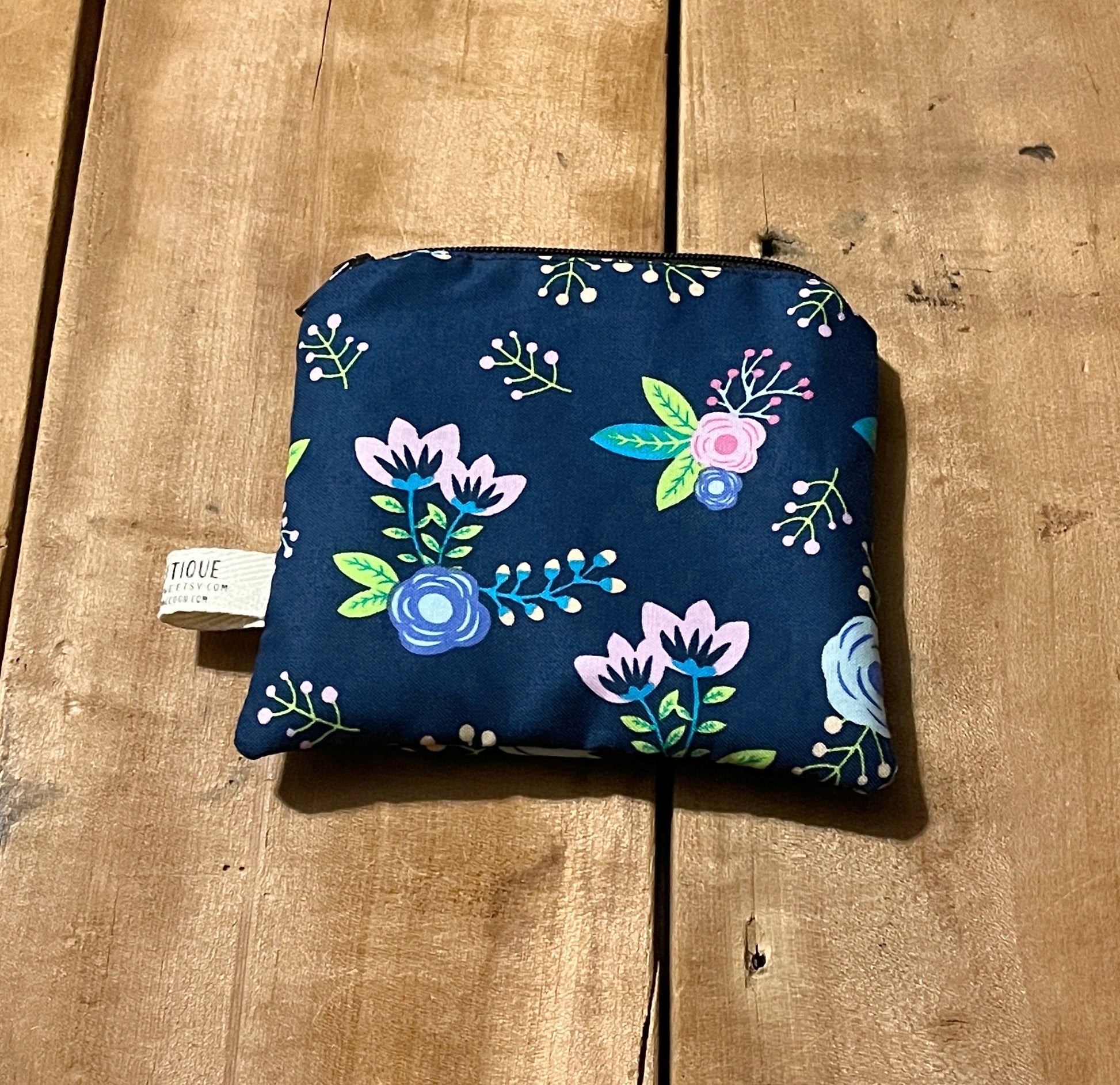 navy floral mini wet bag shown without strap