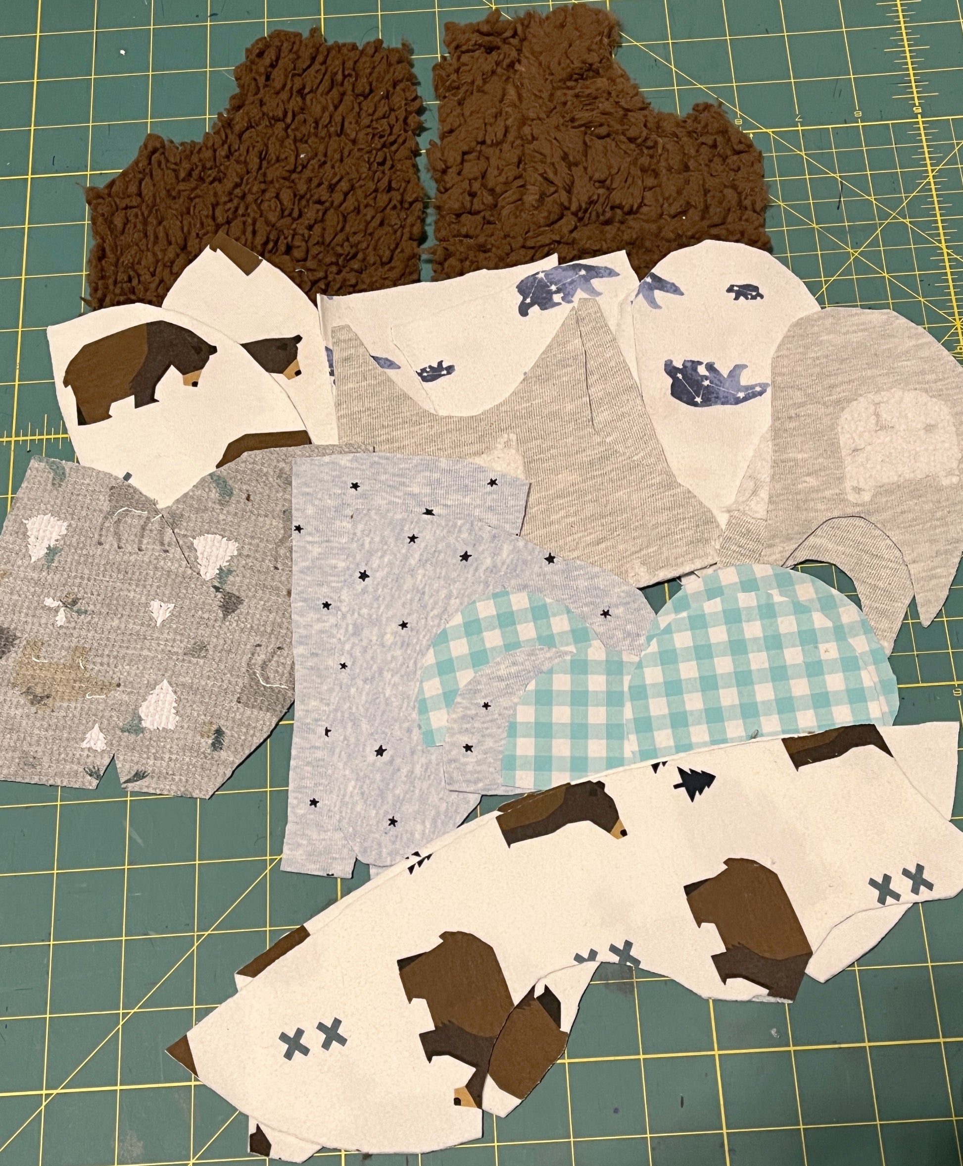 Cut out baby clothes pieces for the bear. Bear made with baby clothes, 12-13" size.