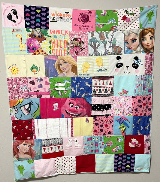 baby clothes quilt made out of baby clothes. this one is a 42x48