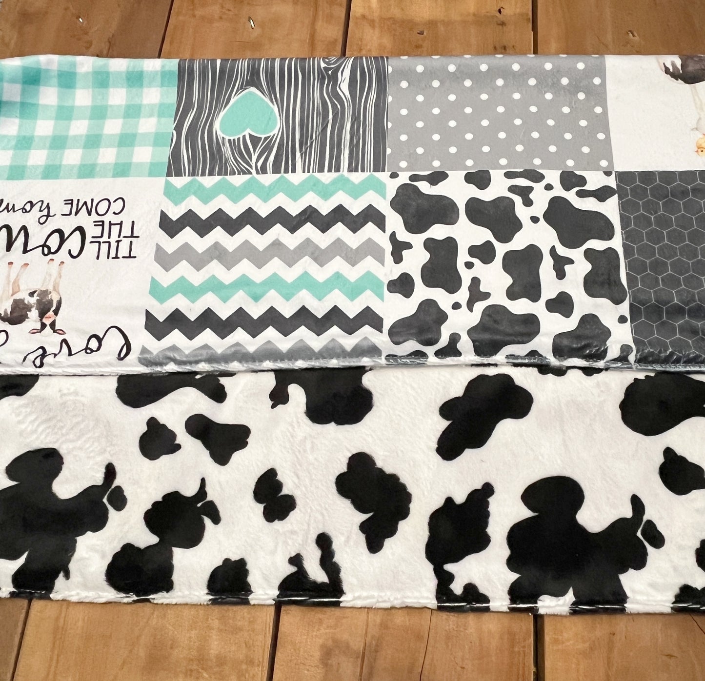 Farm animal blanket, mint, gray and black, "love you till the cows come home", shown with cow print minky on the back.