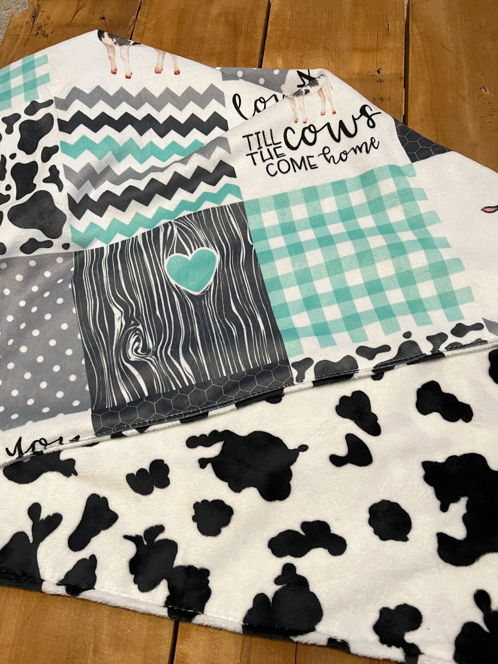 Farm animal blanket, mint, gray and black, "love you till the cows come home", shown with cow print minky on the back.
