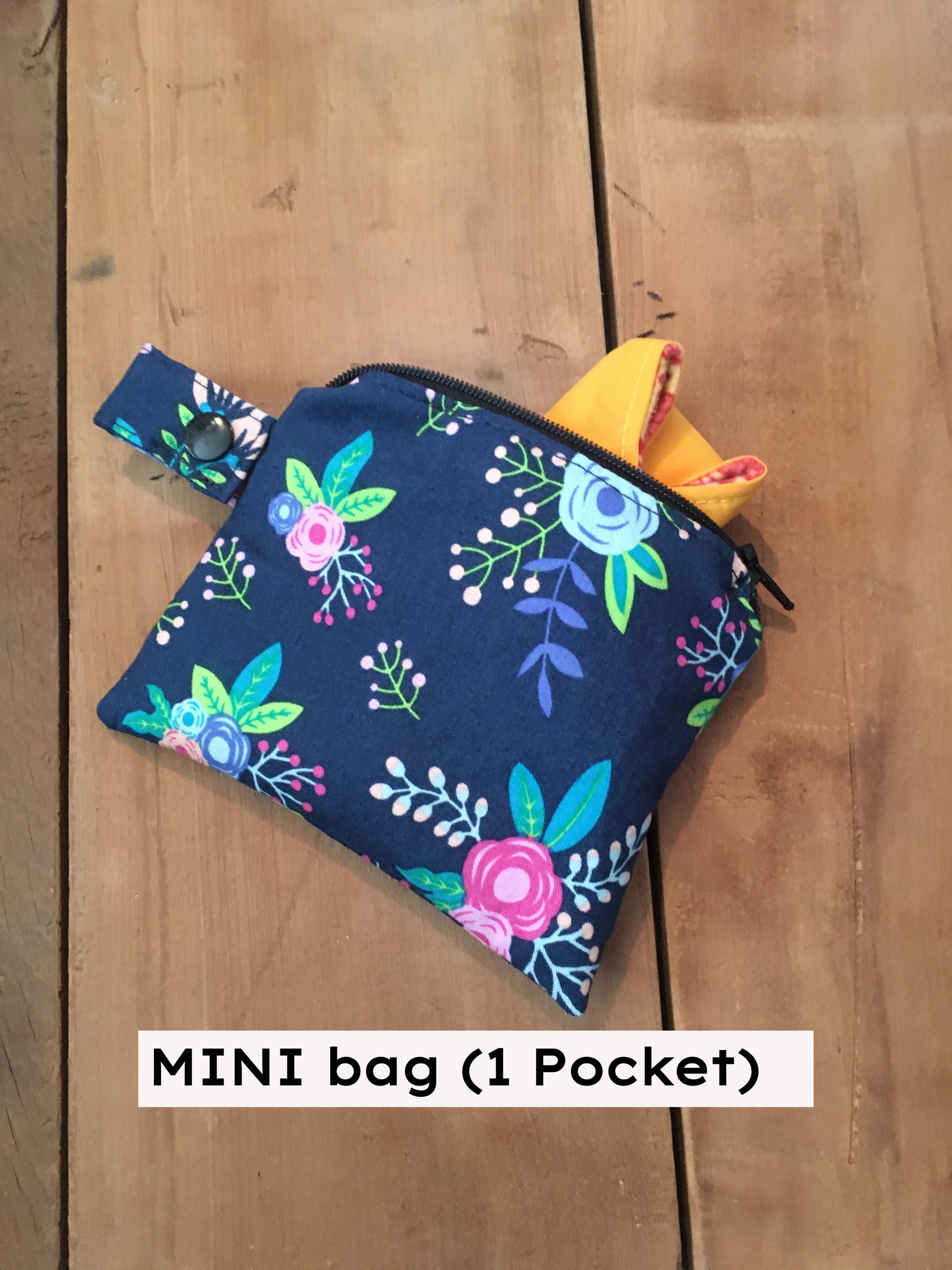navy floral mini wet bag has 1 pocket