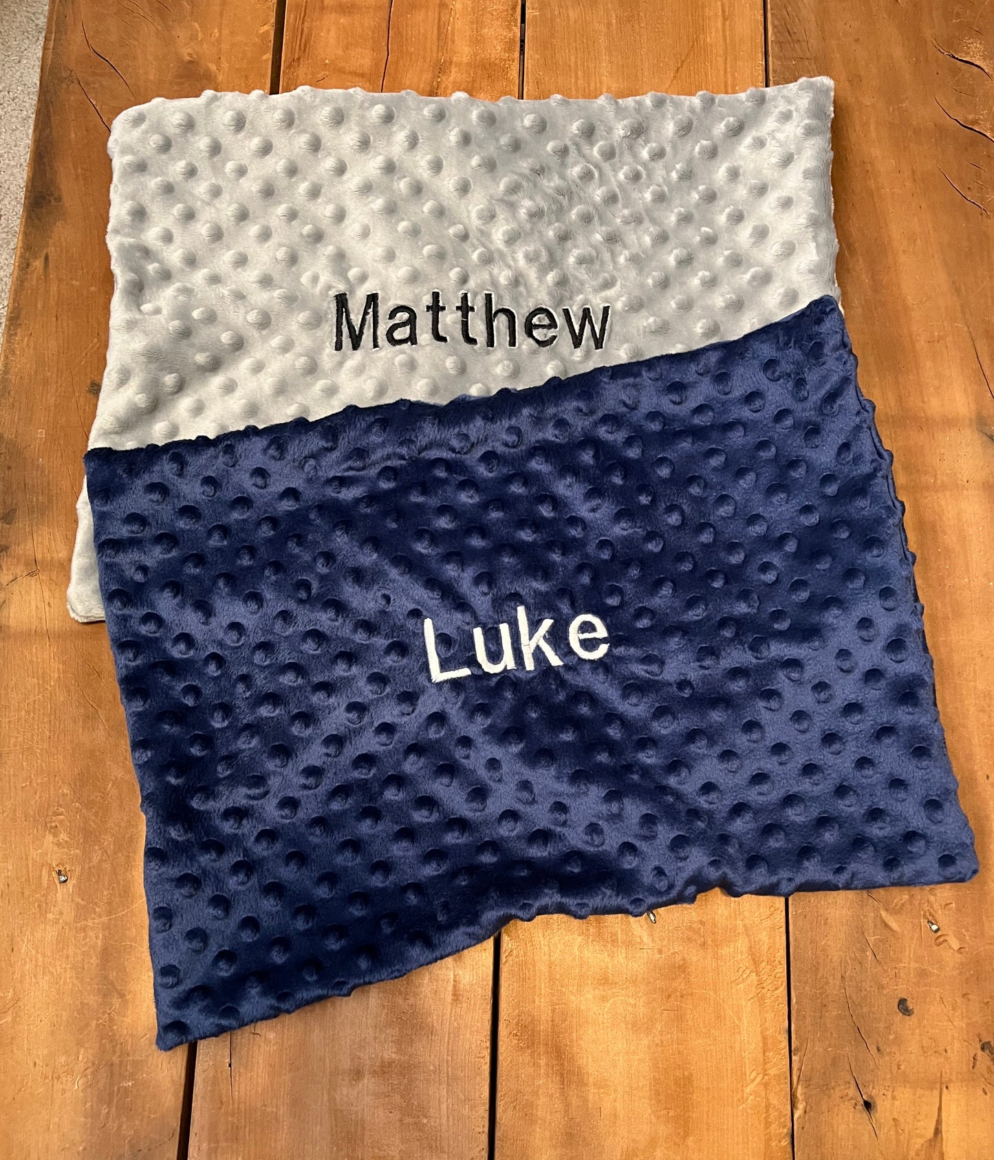grey minky pillow cover & Navy pillow cover shown with embroidered names
