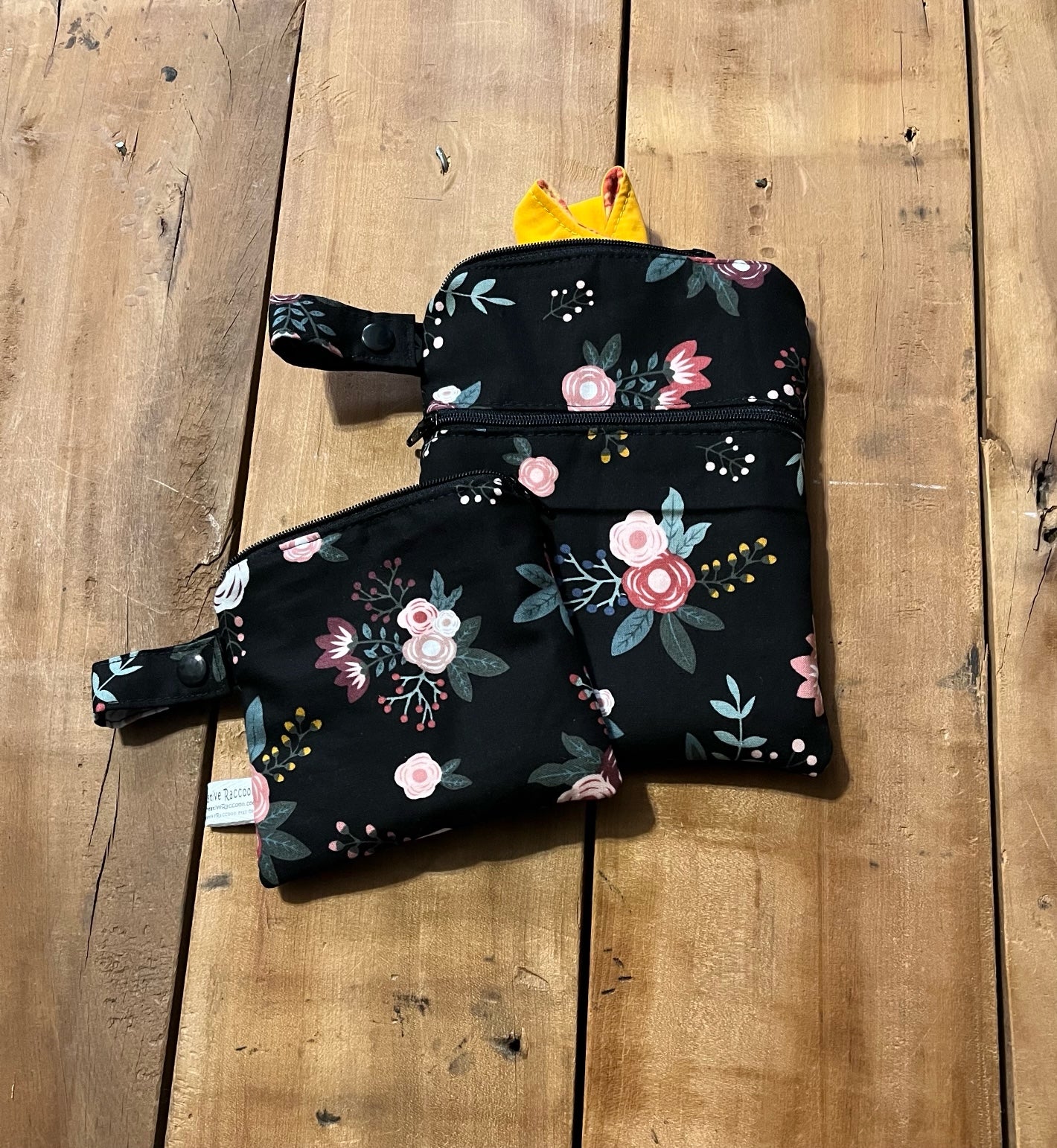 Black Floral wet dry bag - shown in the "big" wet bag & mini wet bag