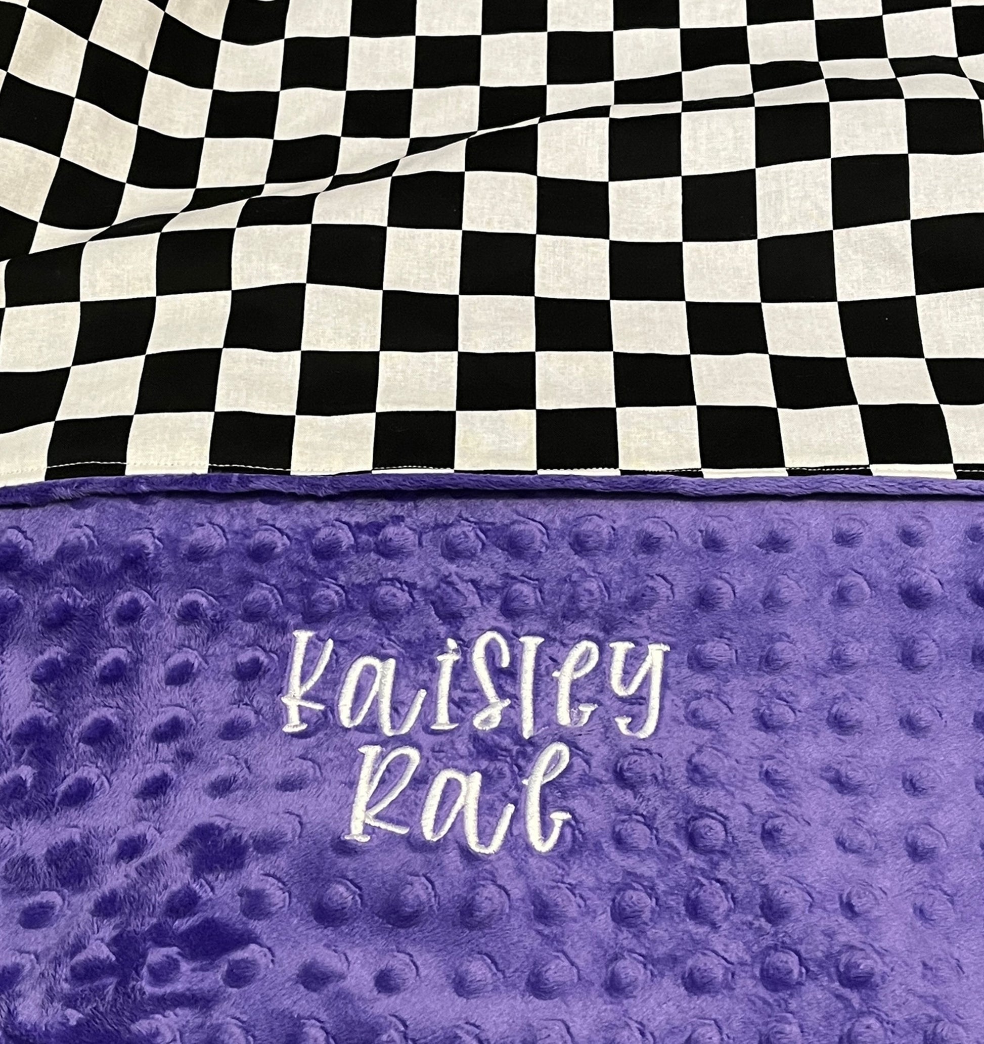 racing check throw blanket shown in purple minky