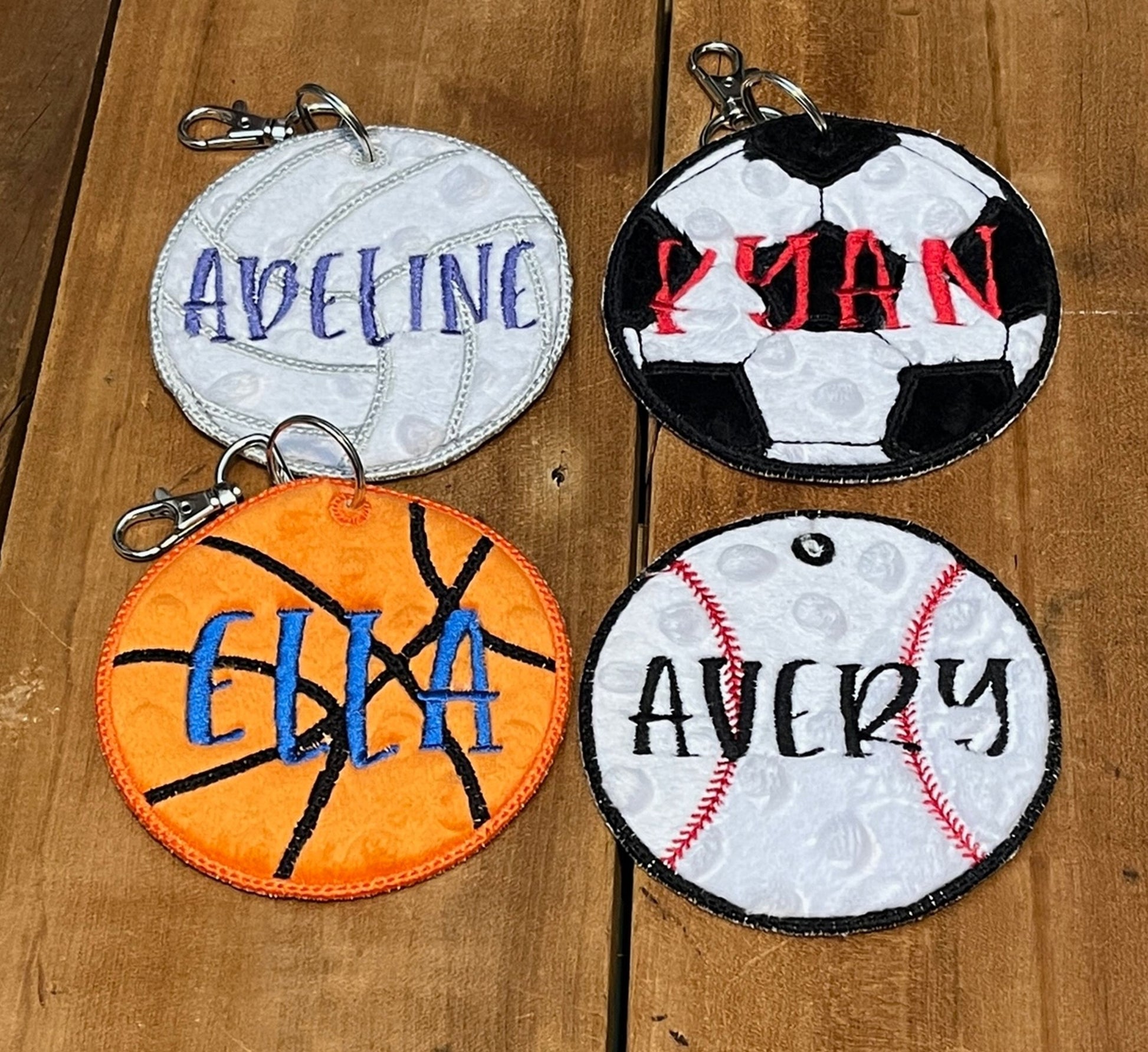 sports bag tag; volleyball, soccer, basketball, & baseball