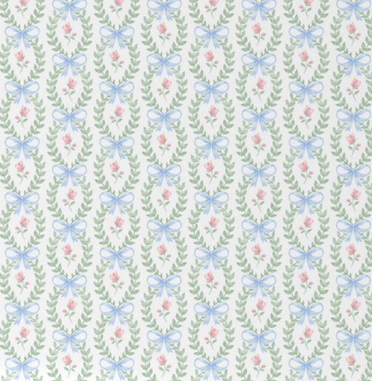 Pattern of blue bows and pink flowers on a light green background.
Pink Rose & Blue Bow Crib Sheet - The Creative Raccoon