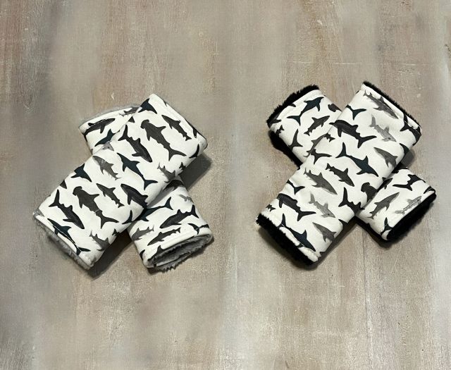 Shark Car Seat Strap Covers shown with black minky back and a set with gray minky back. 
Shark Car Seat Strap Covers Nautical Nursery - The Creative Raccoon