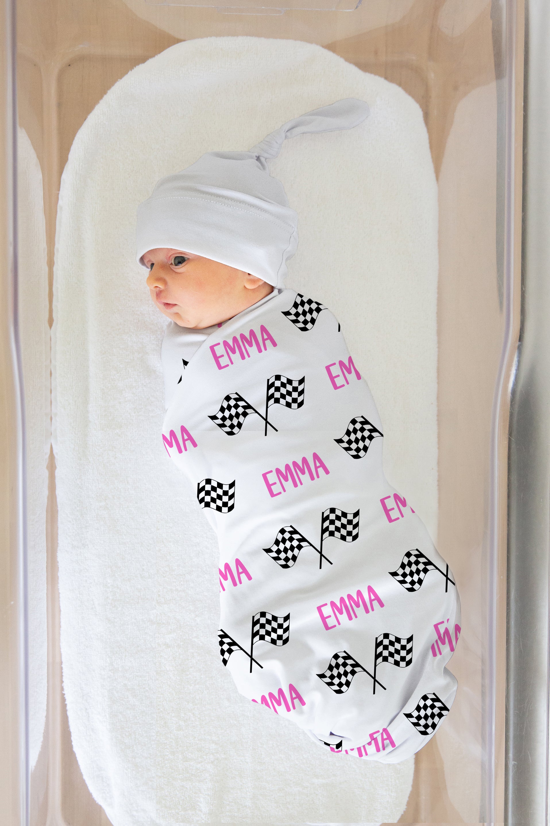 racing chekered flag with name swaddle blanket. Name shown in pink. Matching hat available upon request.