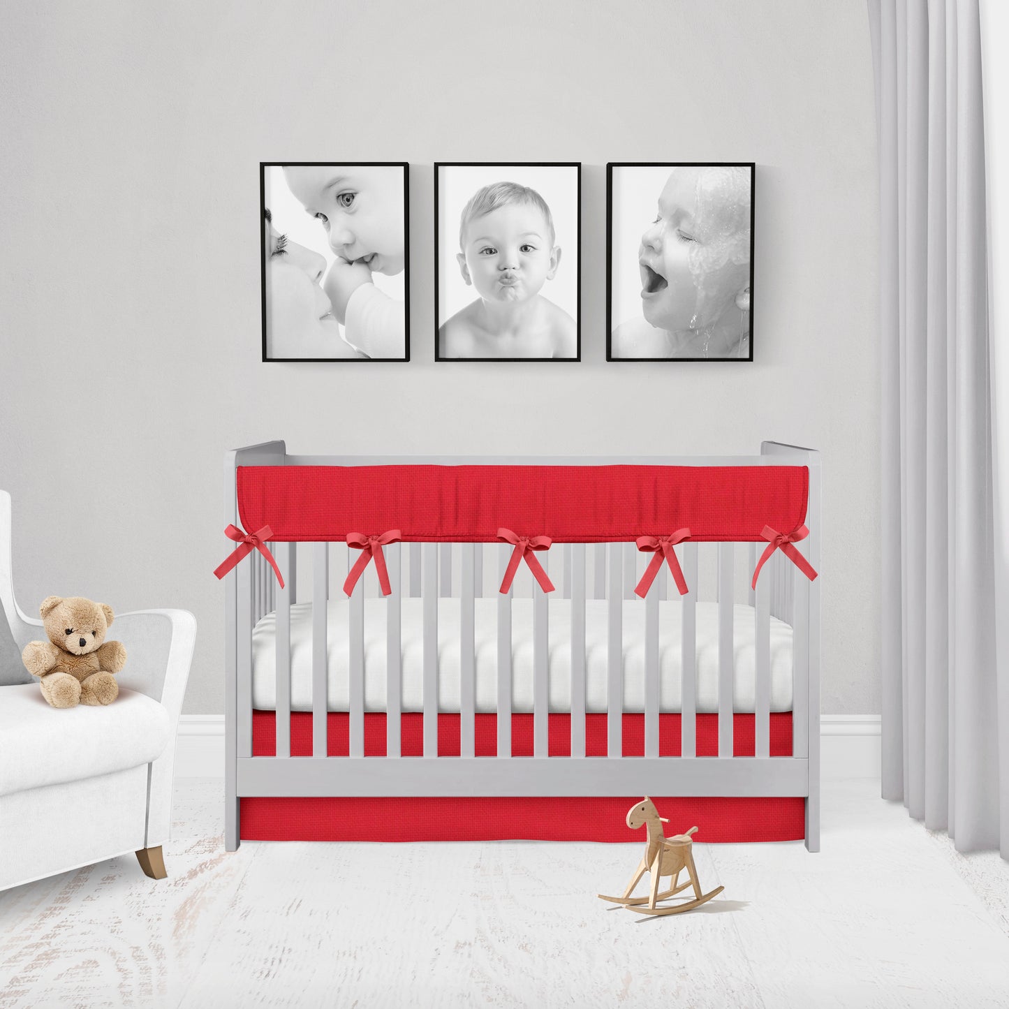 red crib rail cover & crib skirt shown in the flat option