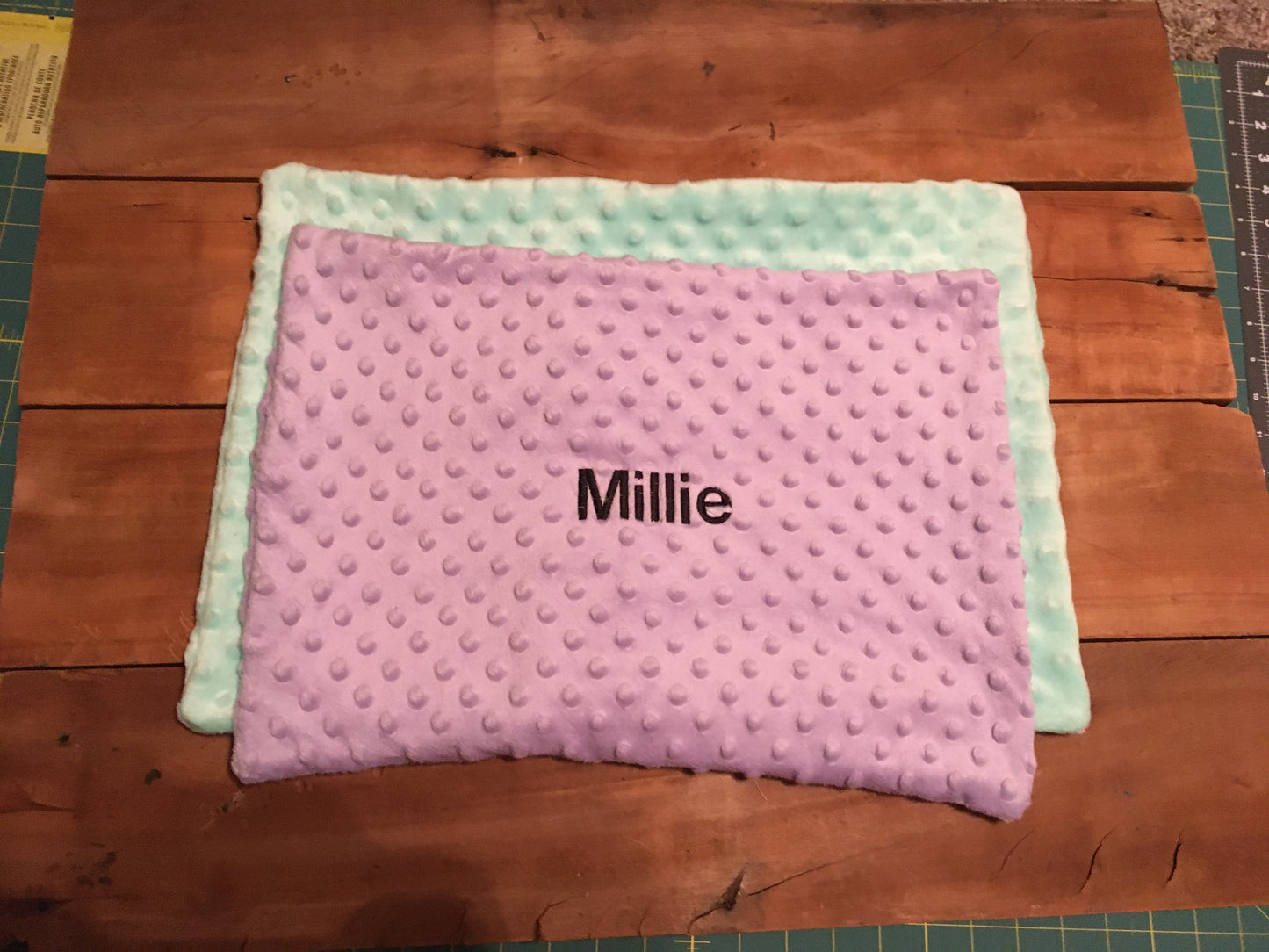 back pillow cover is mint, and top is lavender