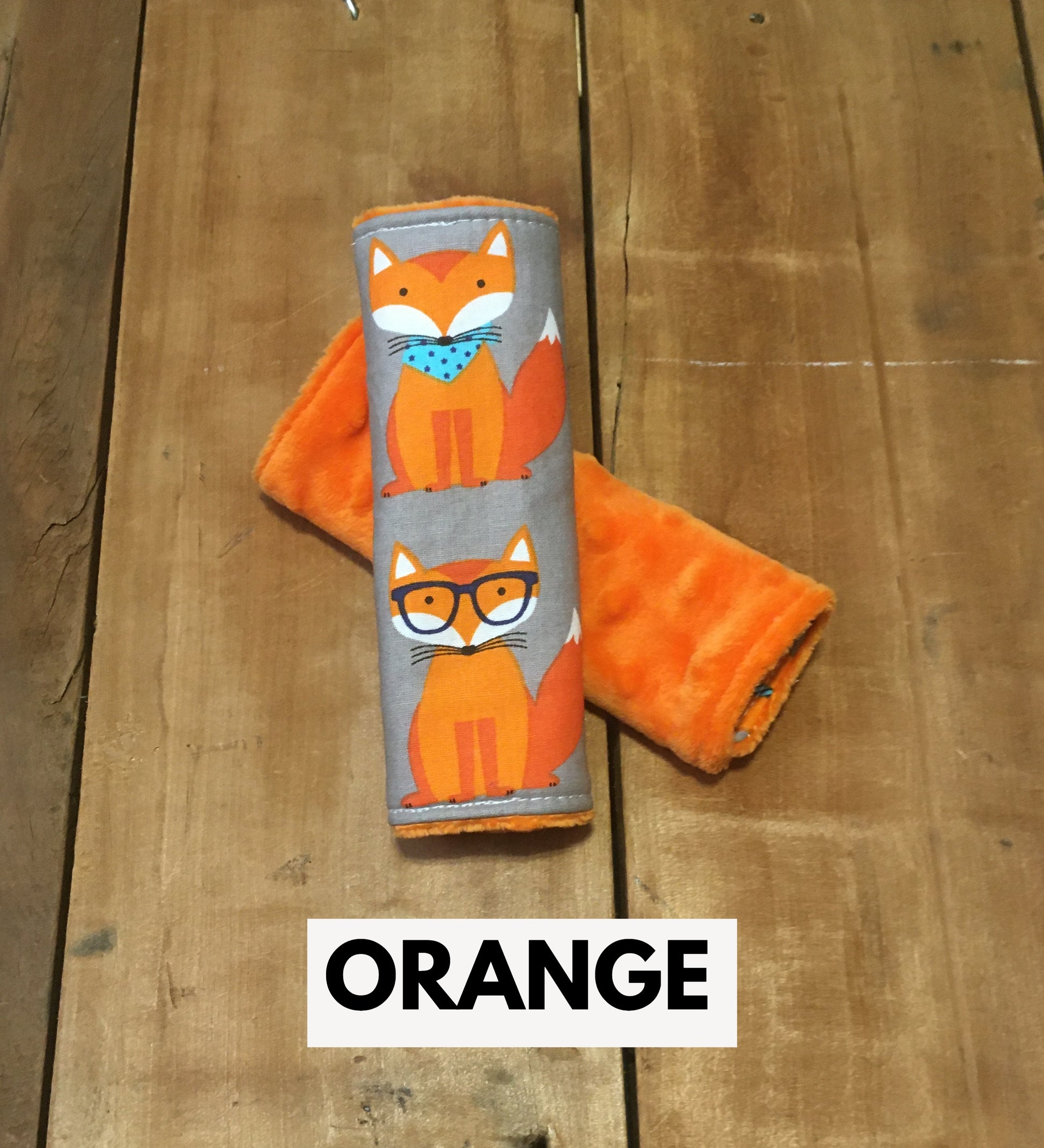 orange nerdy fox car seat strap covers shown in size 5"-6" shown in orange minky