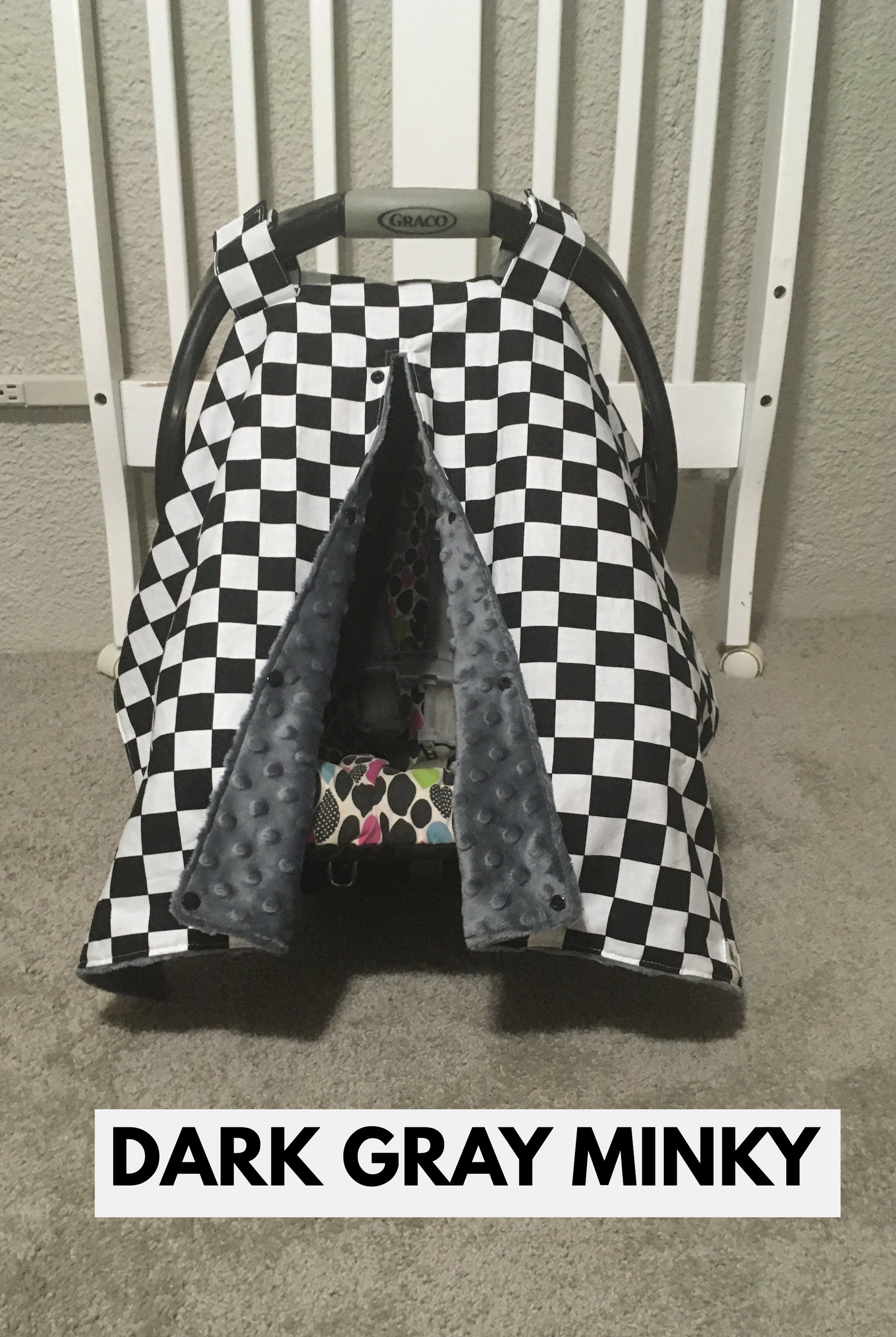 racing check canopy/car seat cover shown in dark gray minky in the open option