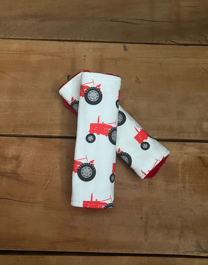 red tractor car seat strap covers shown in the 6" size