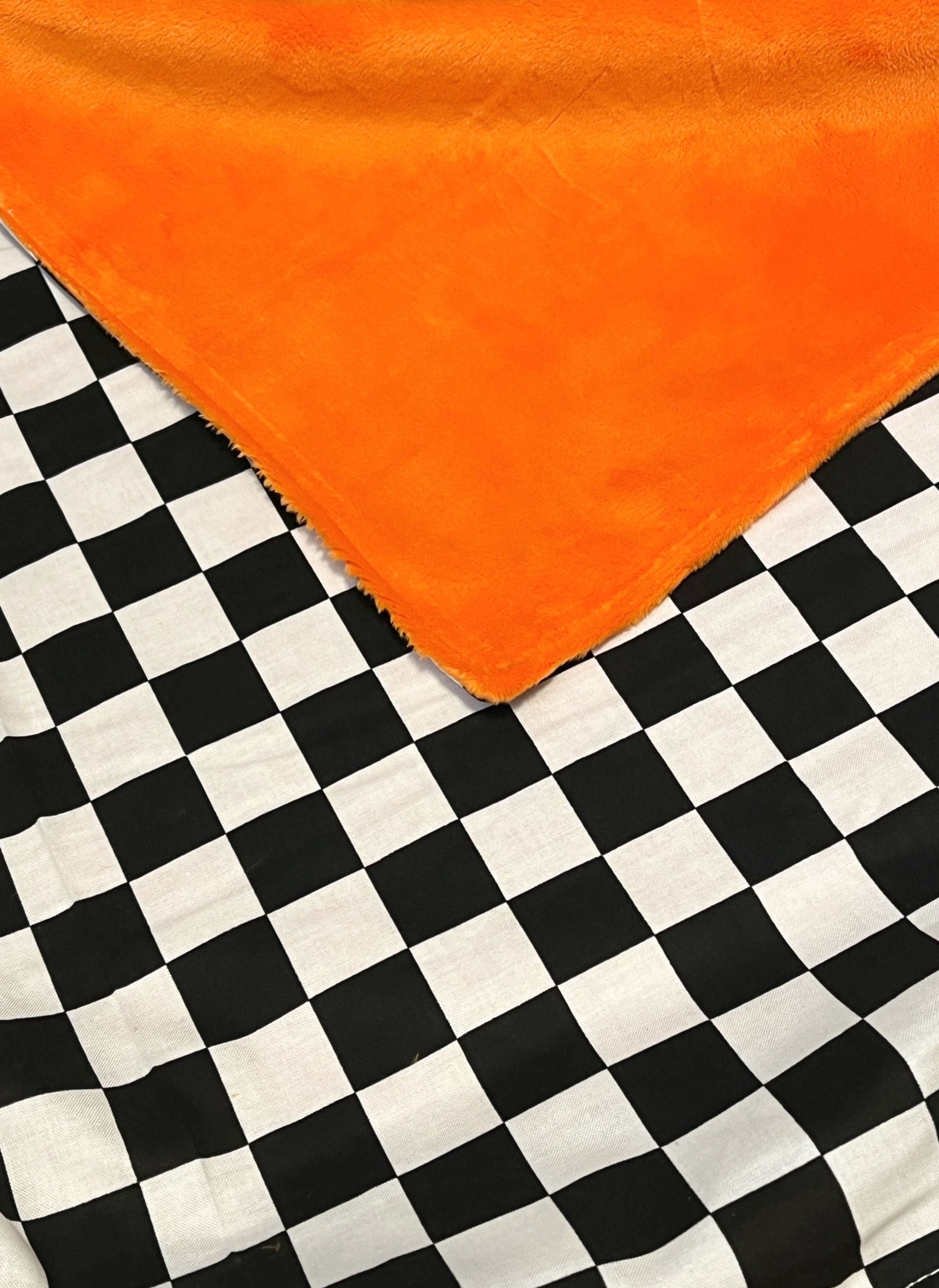 racing check throw blanket shown in orange minky