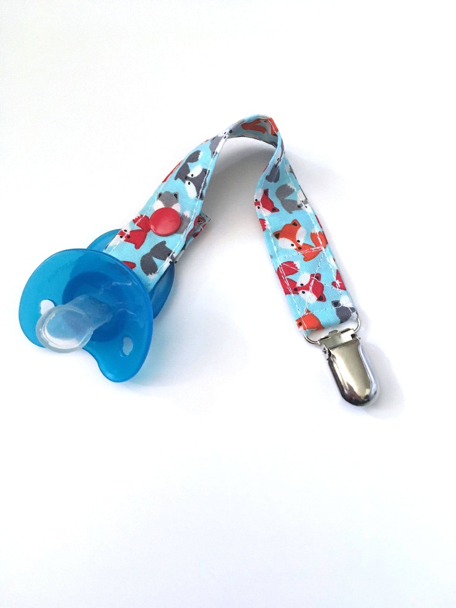 red, gray and orange fox fabric for a pacifier clip