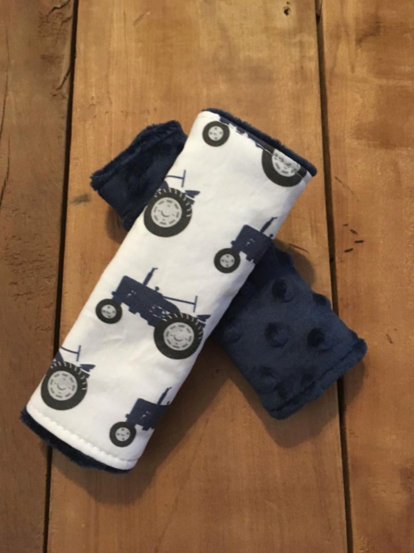 navy tractor car seat strap covers, shown in size 5-6" and navy minky back