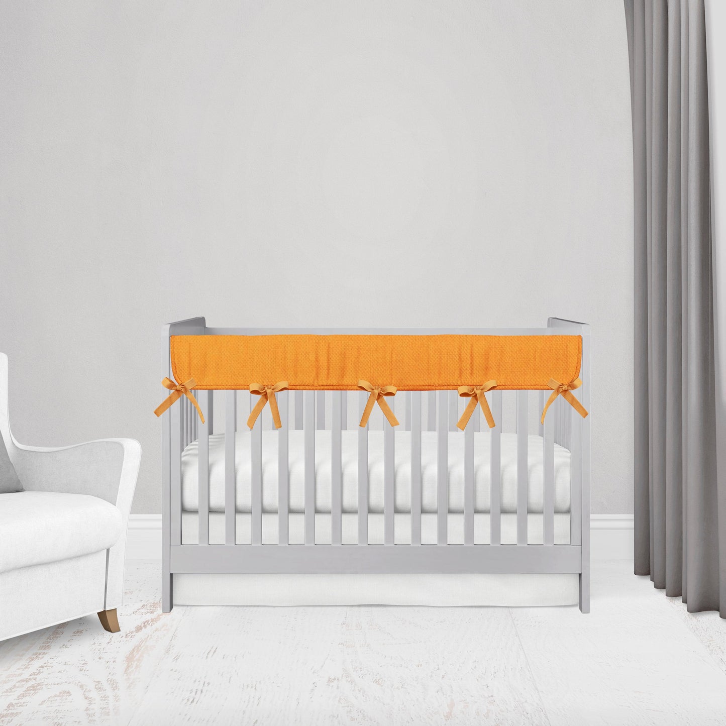 orange mini crib rail cover with orange ties