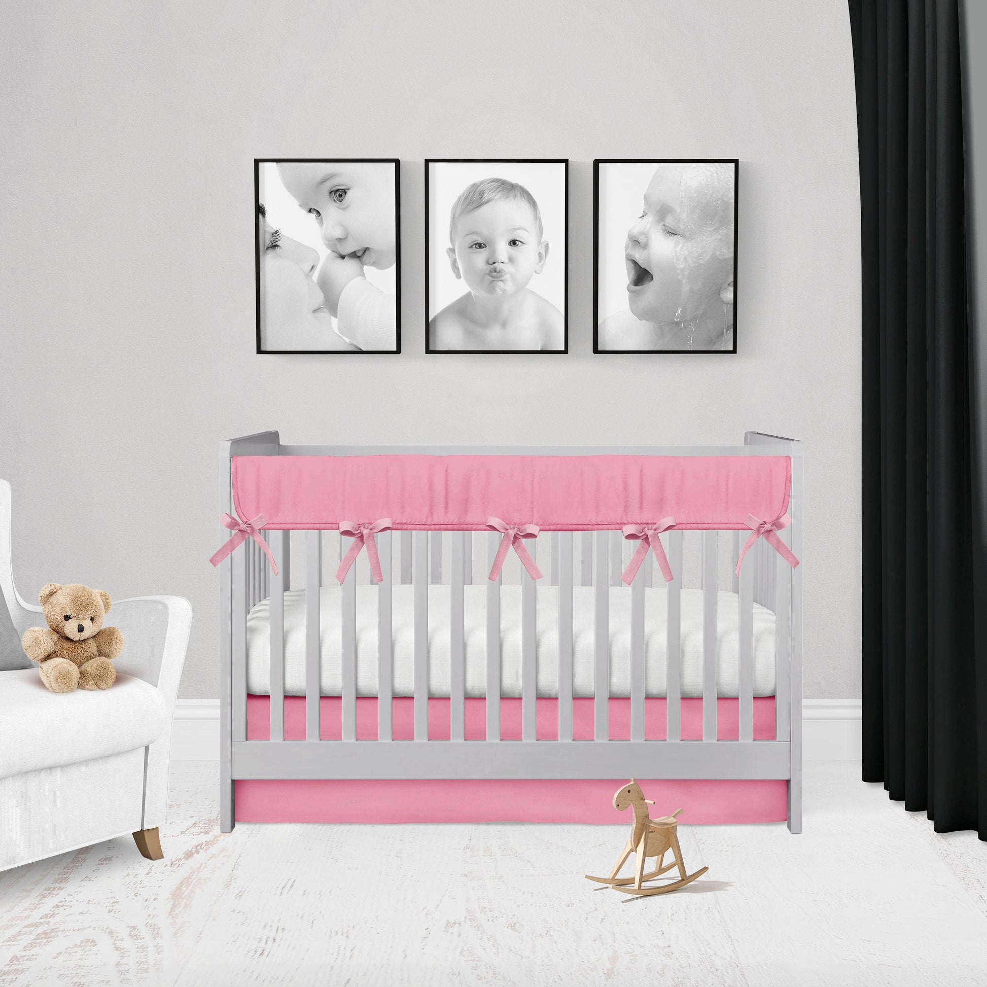 solid hot pink crib rail cover & skirt shown on a crib